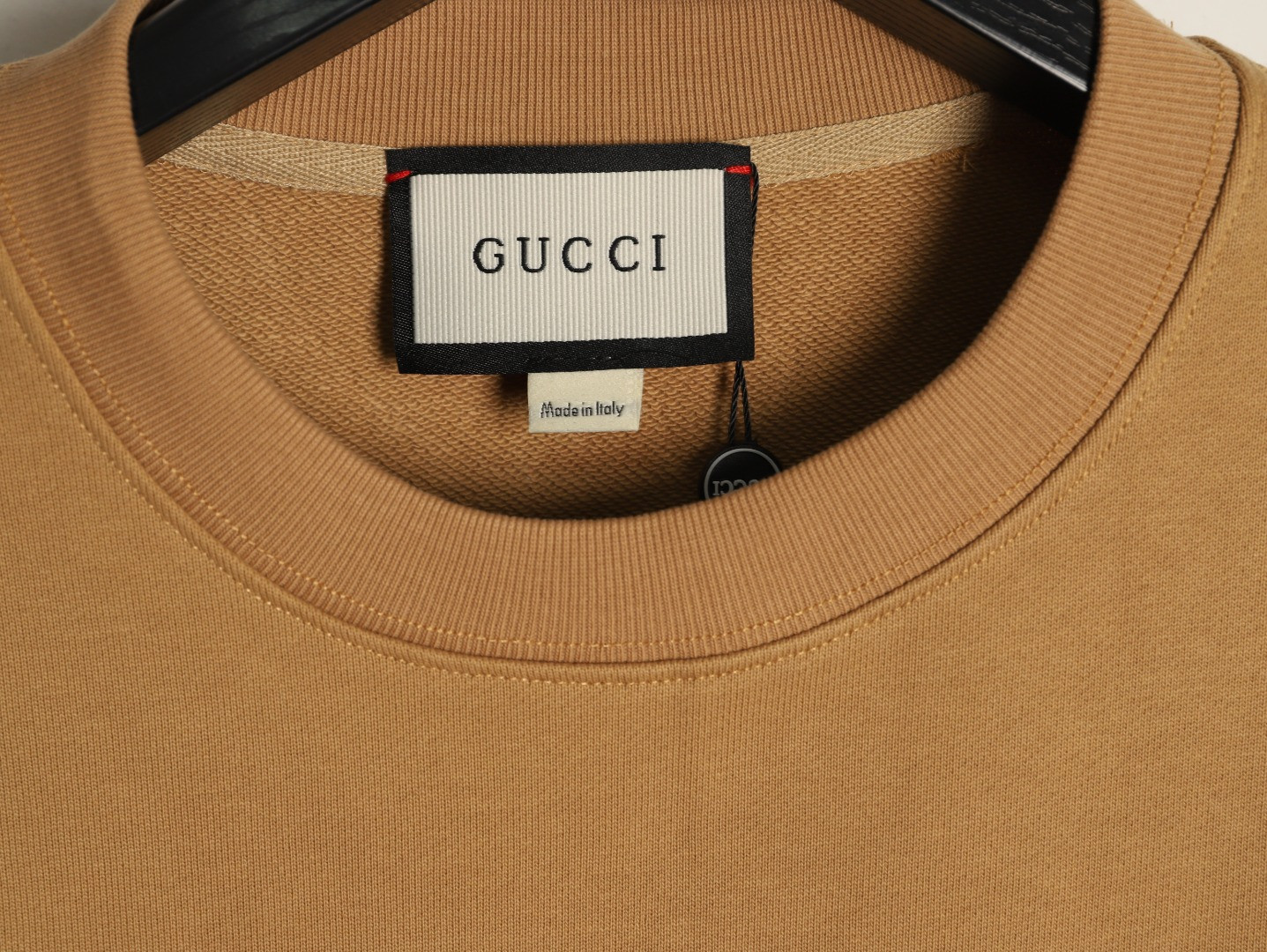 G*u*i hoodies