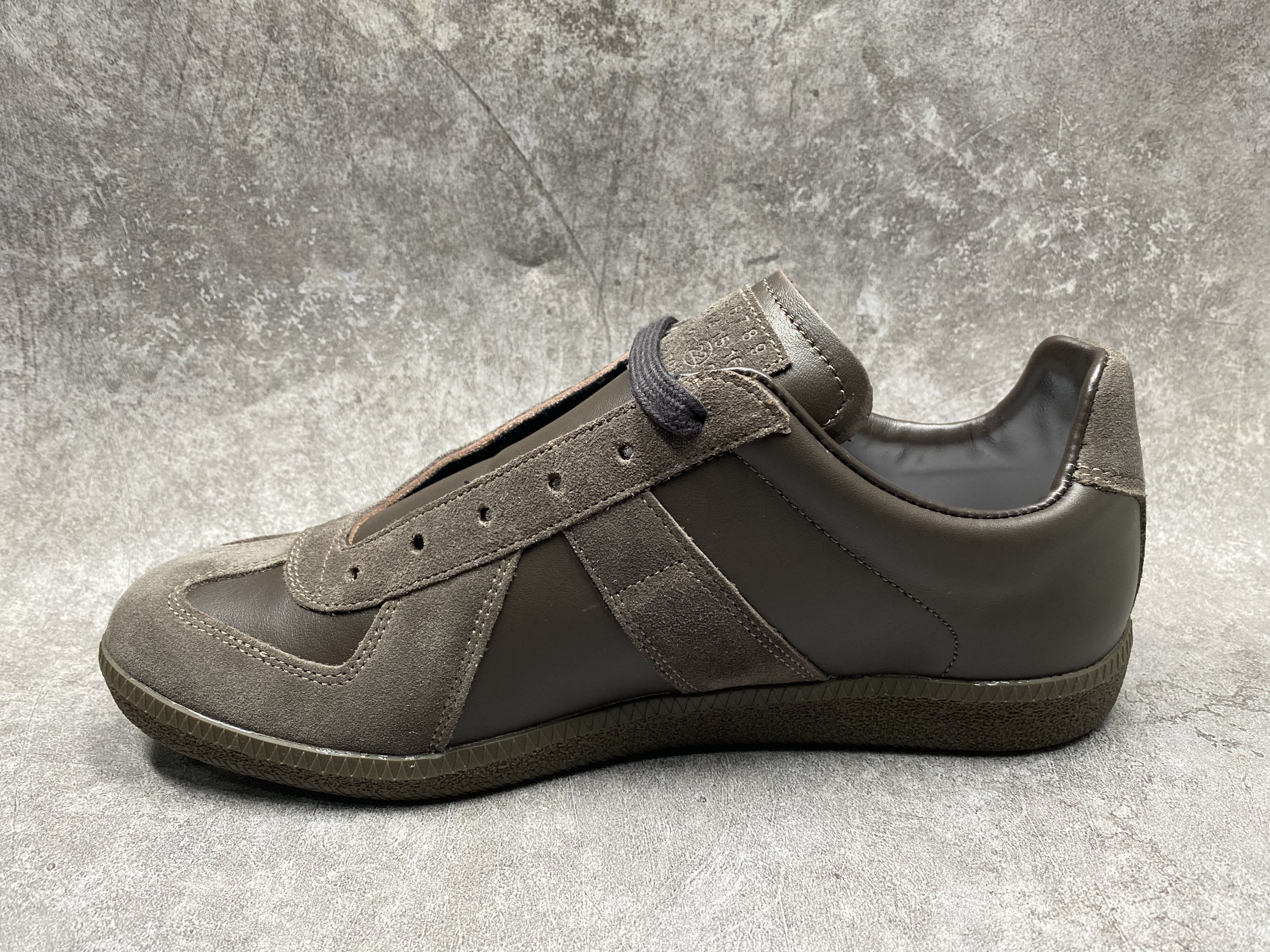ua ma*s*n Ma*i*la mm6 sneakers