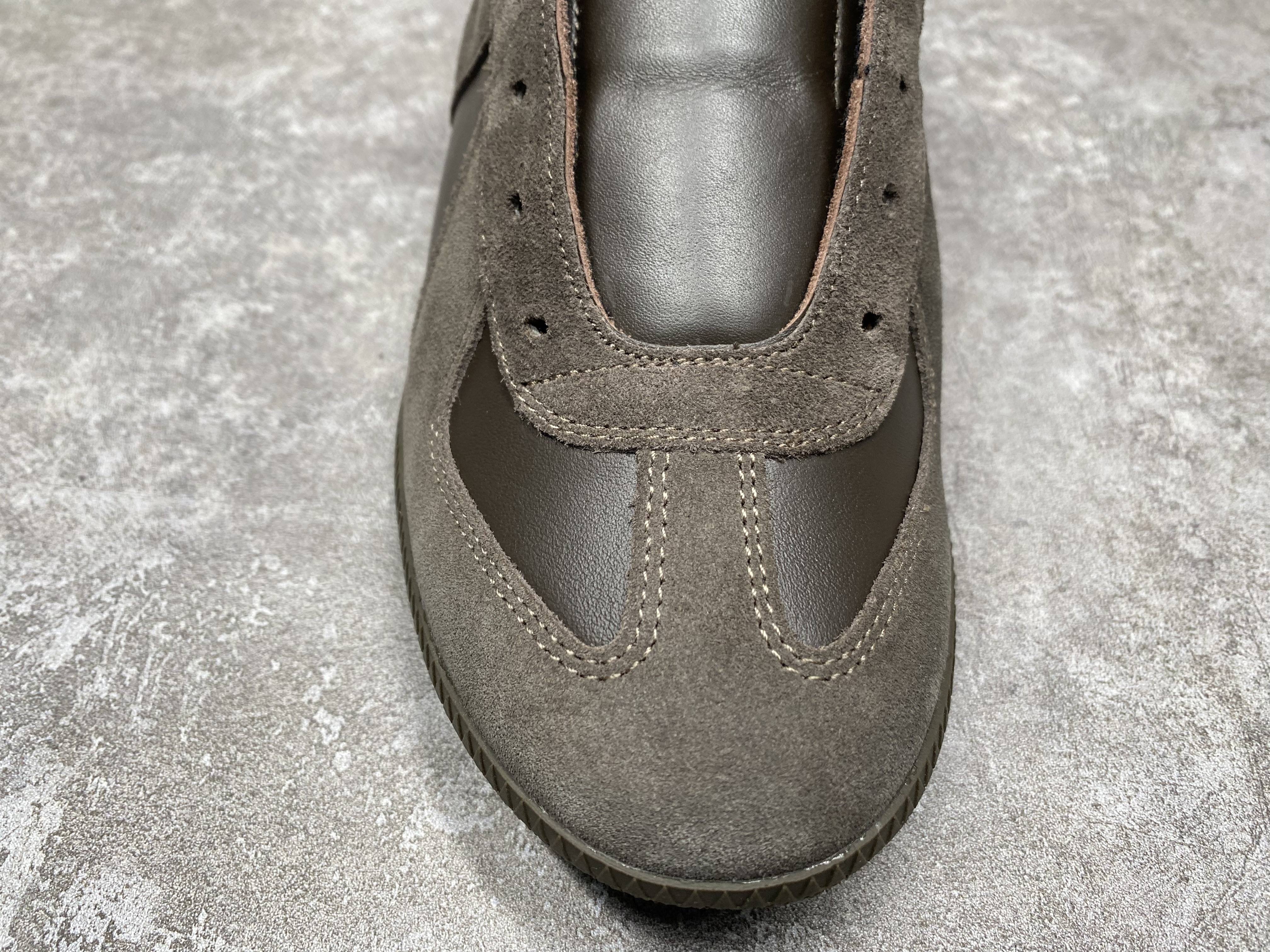 ua ma*s*n Ma*i*la mm6 sneakers