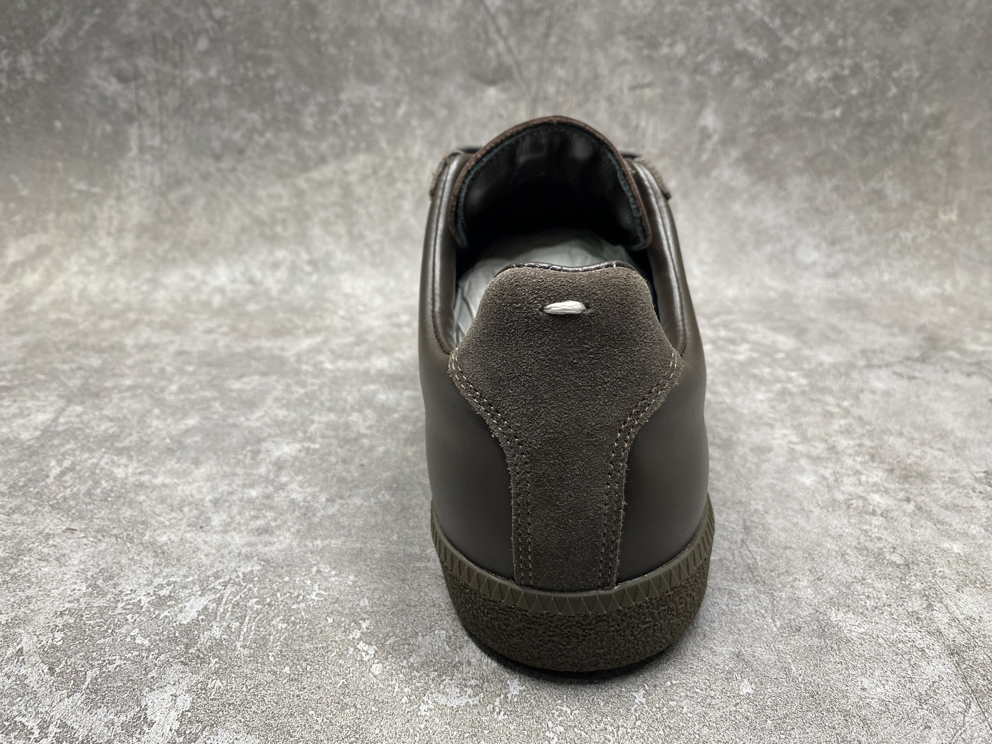 ua ma*s*n Ma*i*la mm6 sneakers
