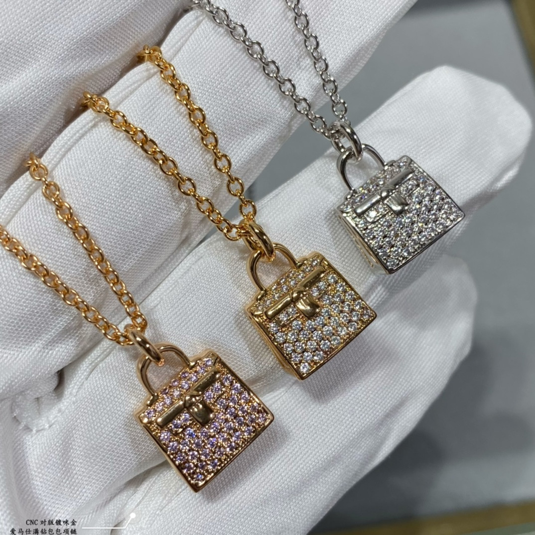 H**mes fully di*m*nd-encrusted bag necklace