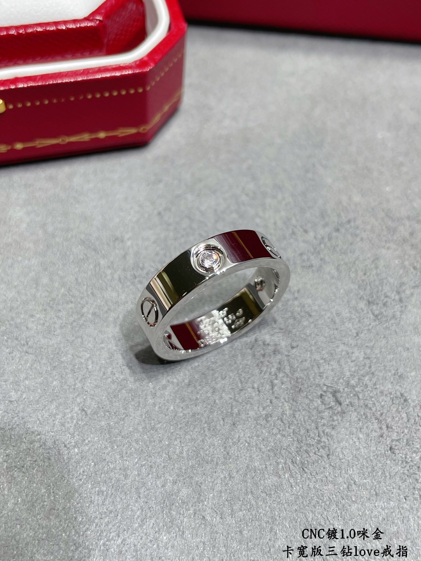 ca*t*er wide version three-Di*m*nd love ring