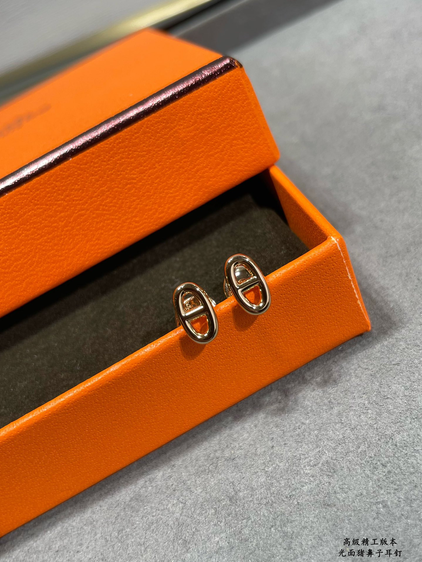H**mes pig nose stud earrings