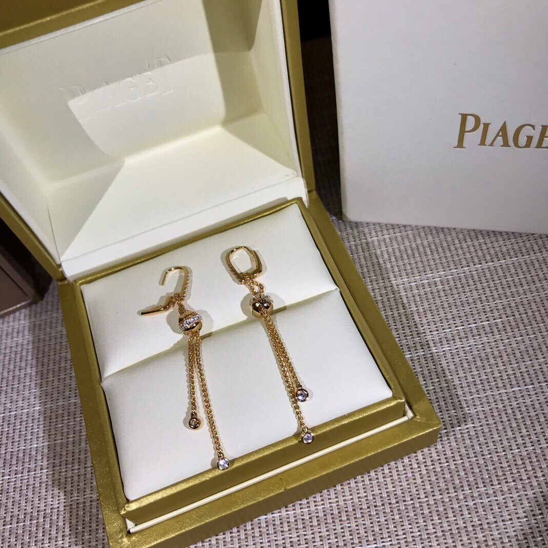 P1aget possession pull tassel earrings