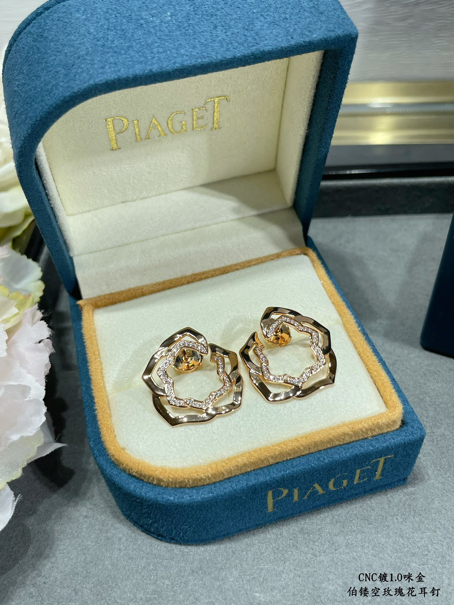 P1aget hollow rose earrings