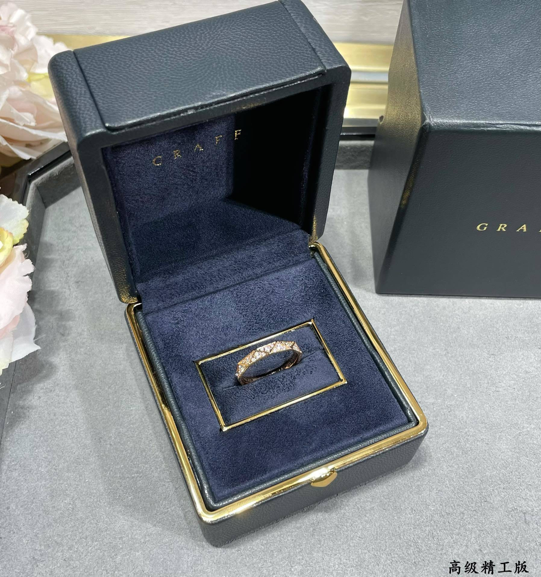 Gr*ff di*m*nd-encrusted rhombus ring
