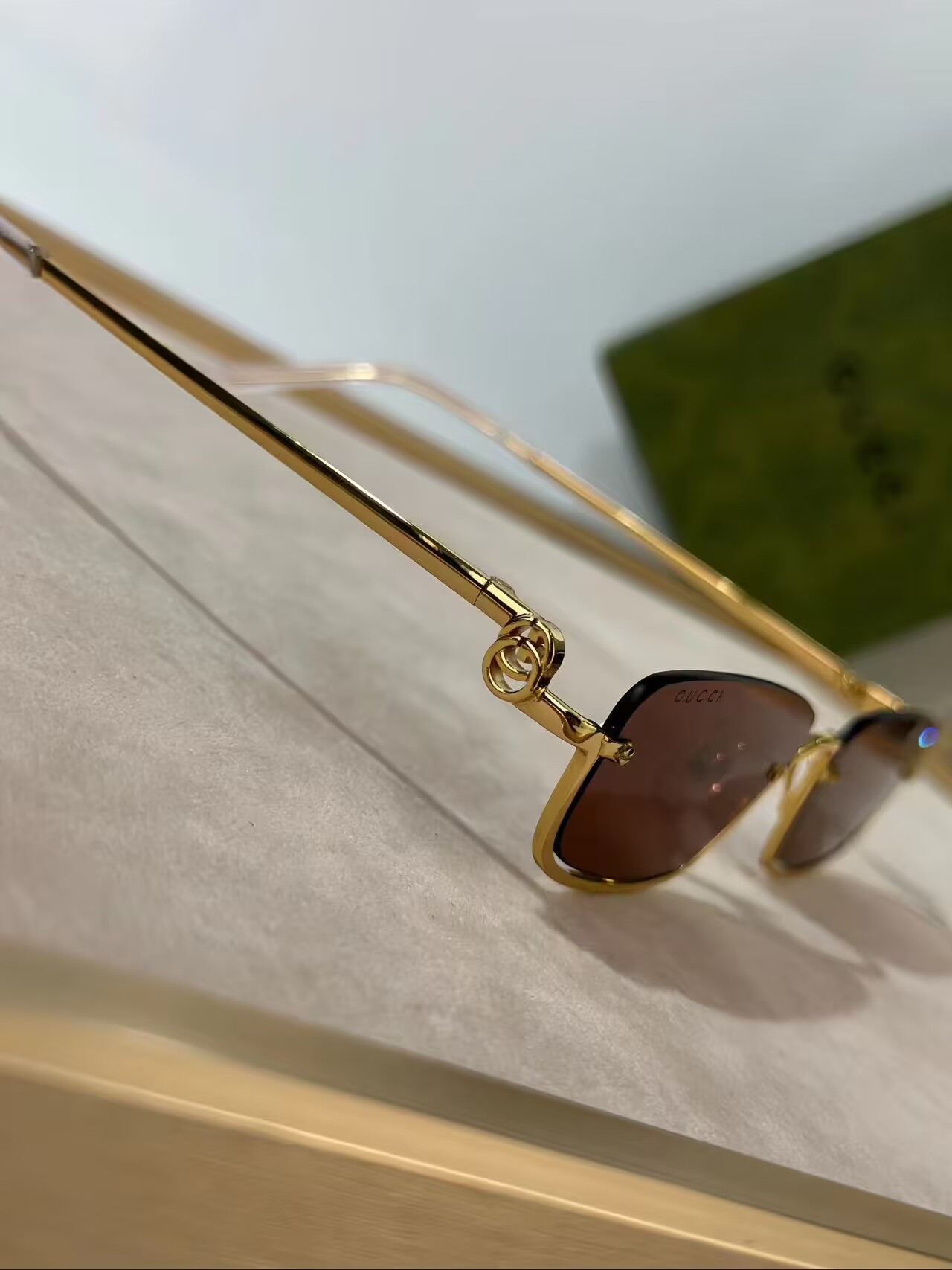 G*u*i sunglasses