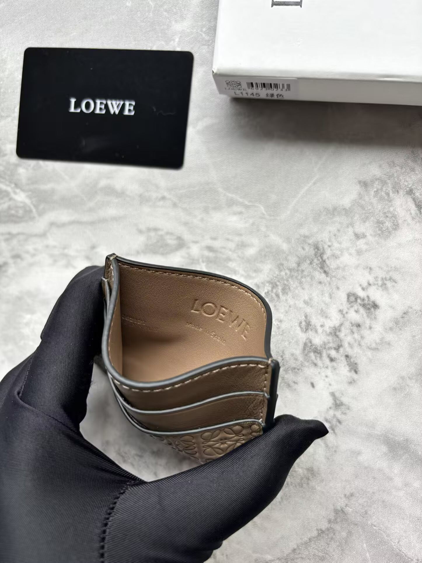 L0ew* cardholder