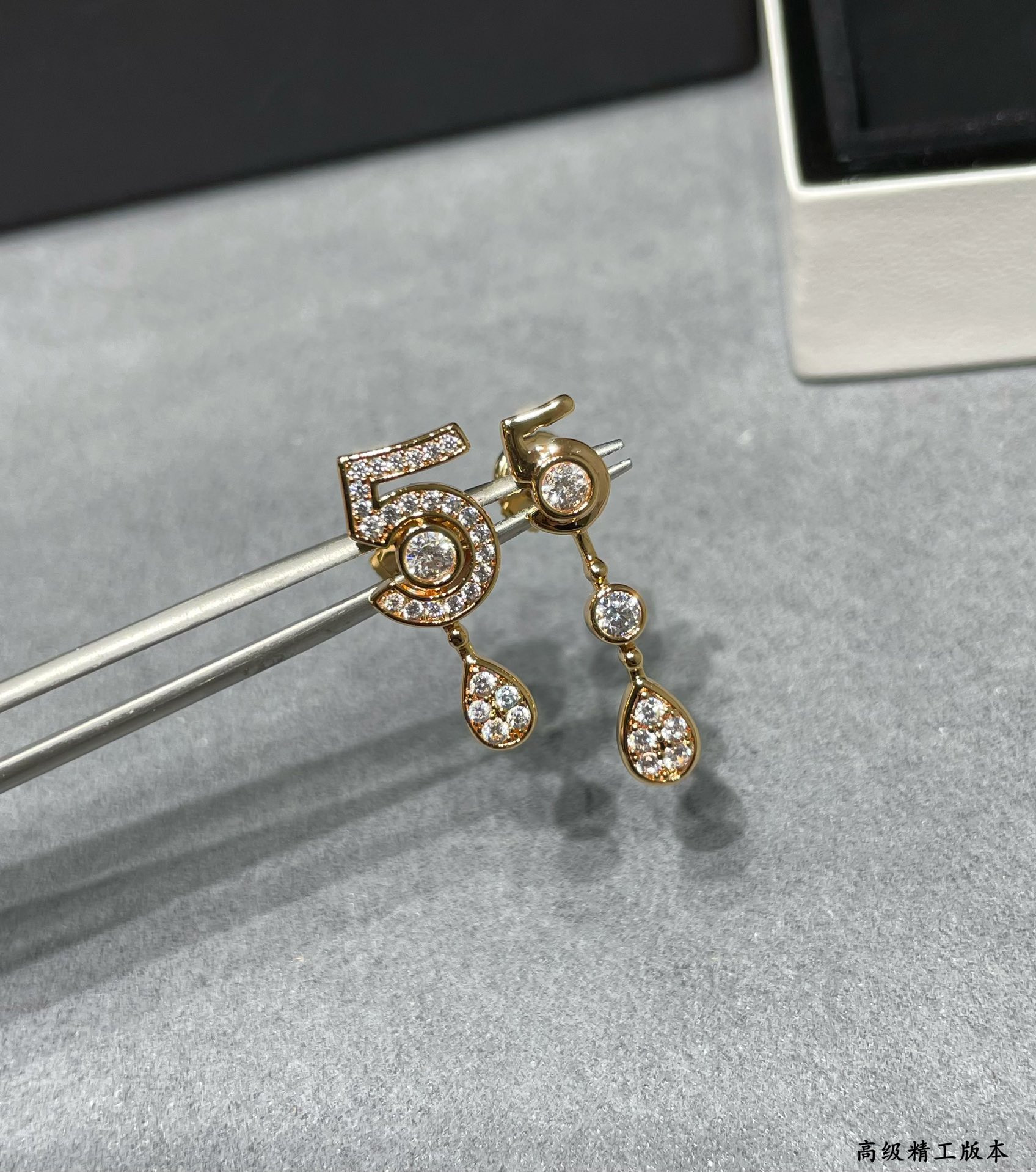 Ch*el 5-word earrings