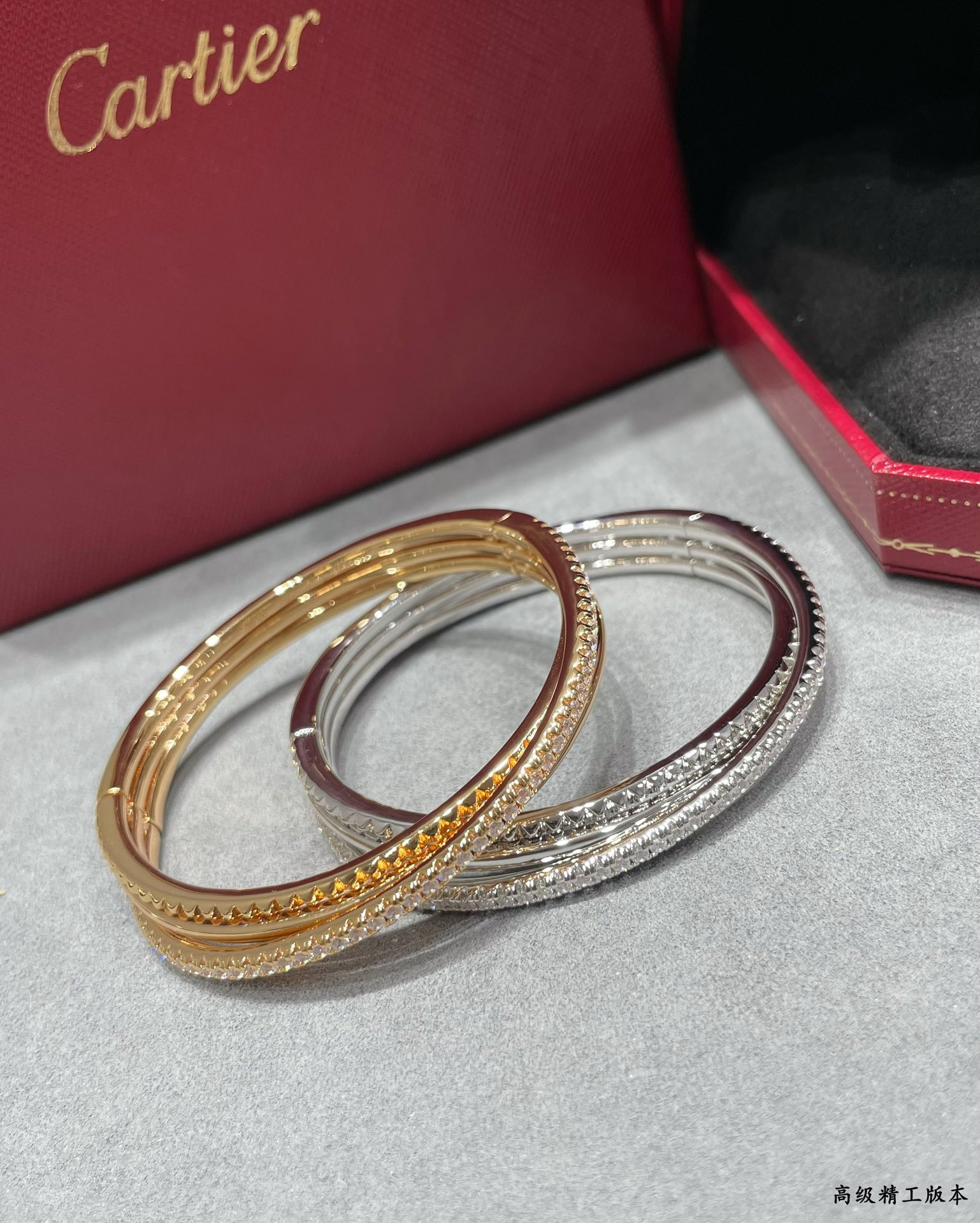 Ca*t*er three-ring rivet bracelet