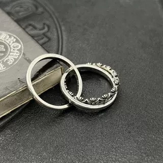 Ch**me He**ts triple ring cross flower ring