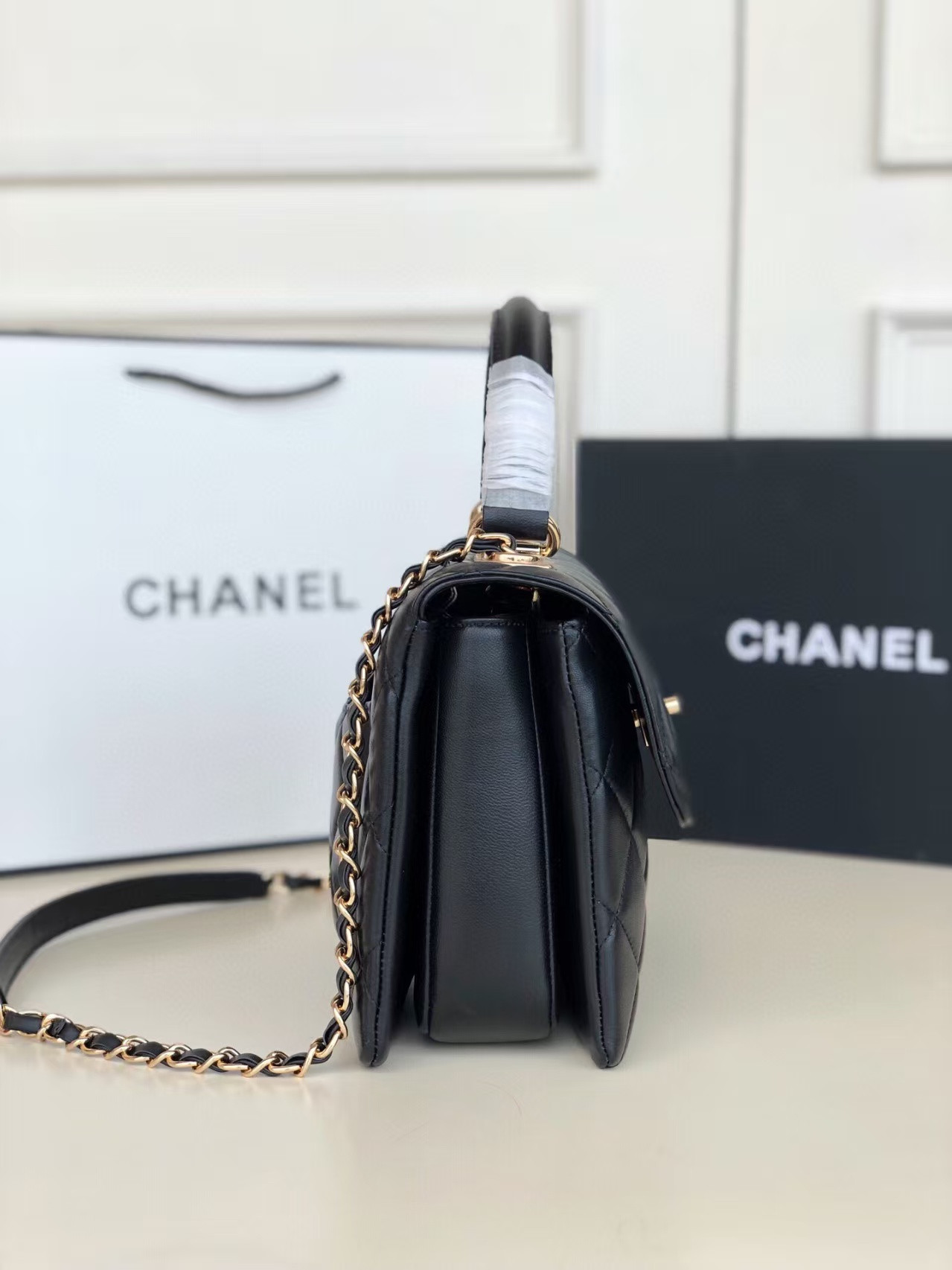 Ch*el flap bag with top handle 6.6 × 9.8 × 4.7 in