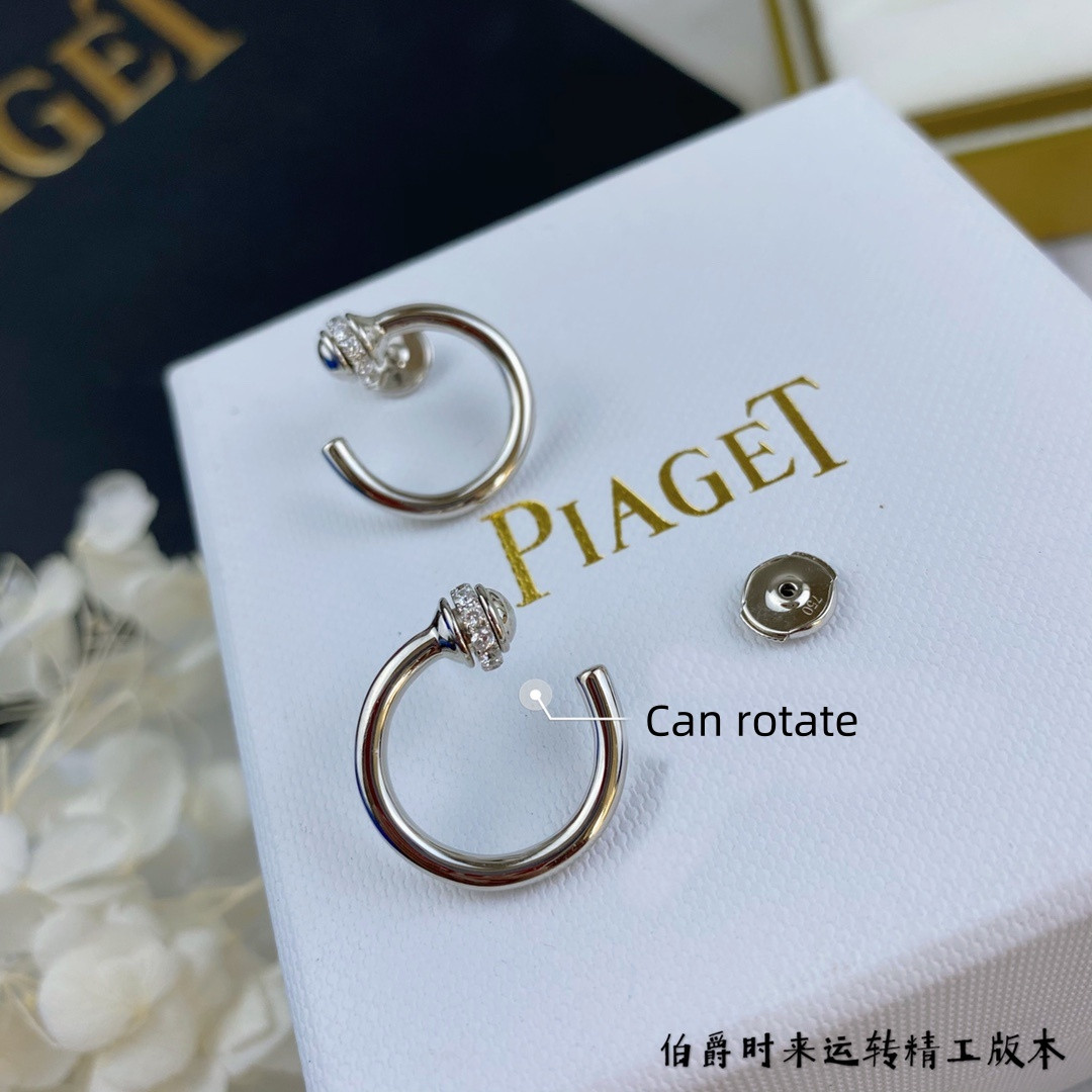 P1aget rotating ball earrings