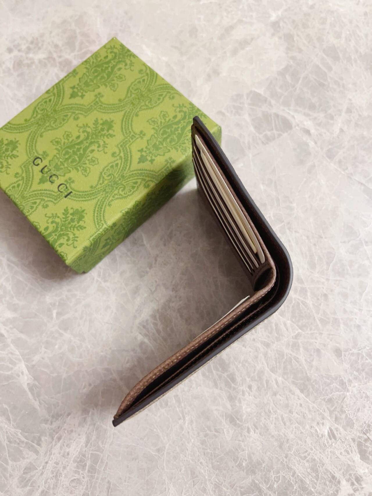 G*u*i brown interior gg bi-fold wallet 10x8.9cm