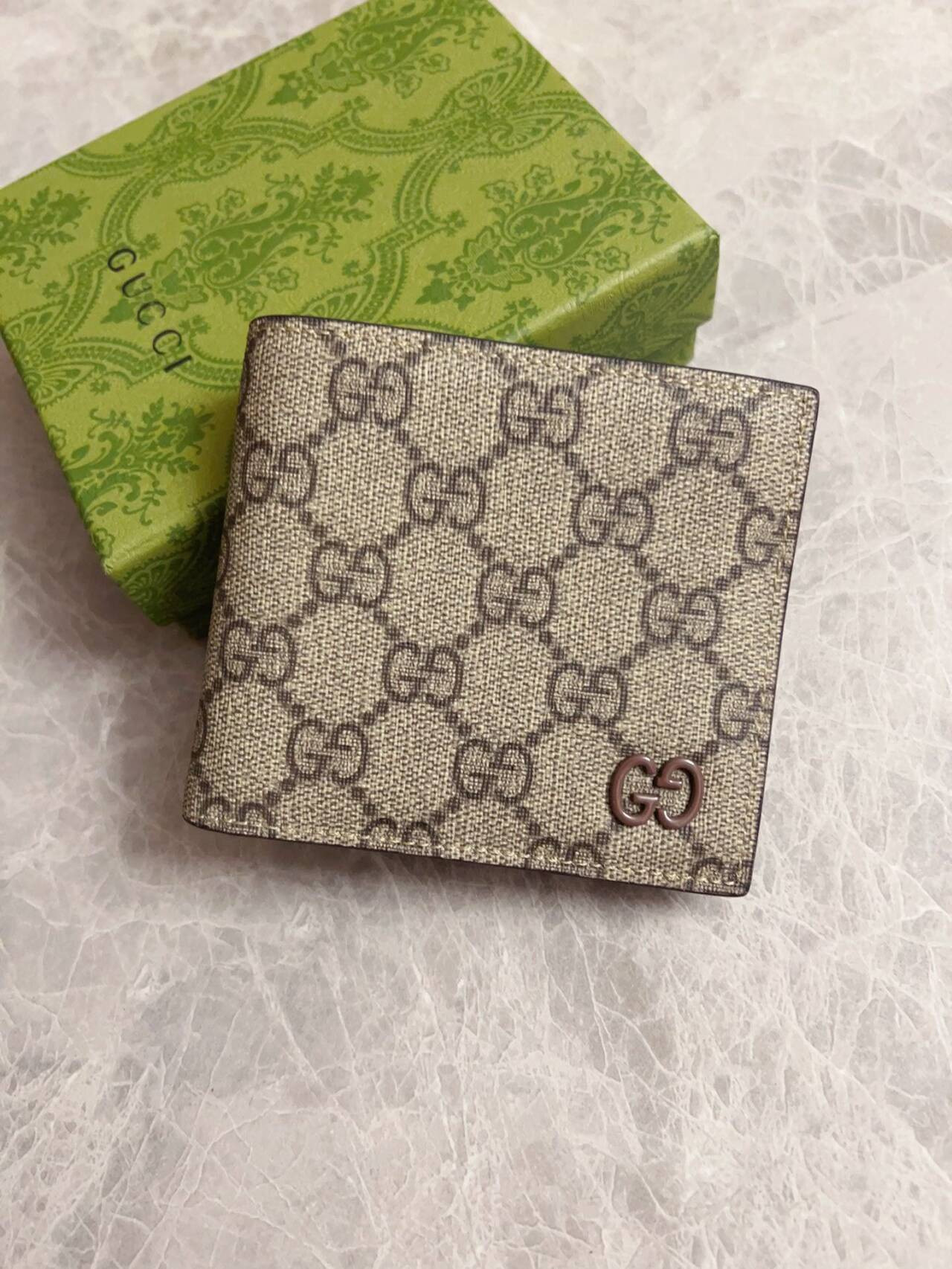 G*u*i brown interior gg bi-fold wallet 10x8.9cm
