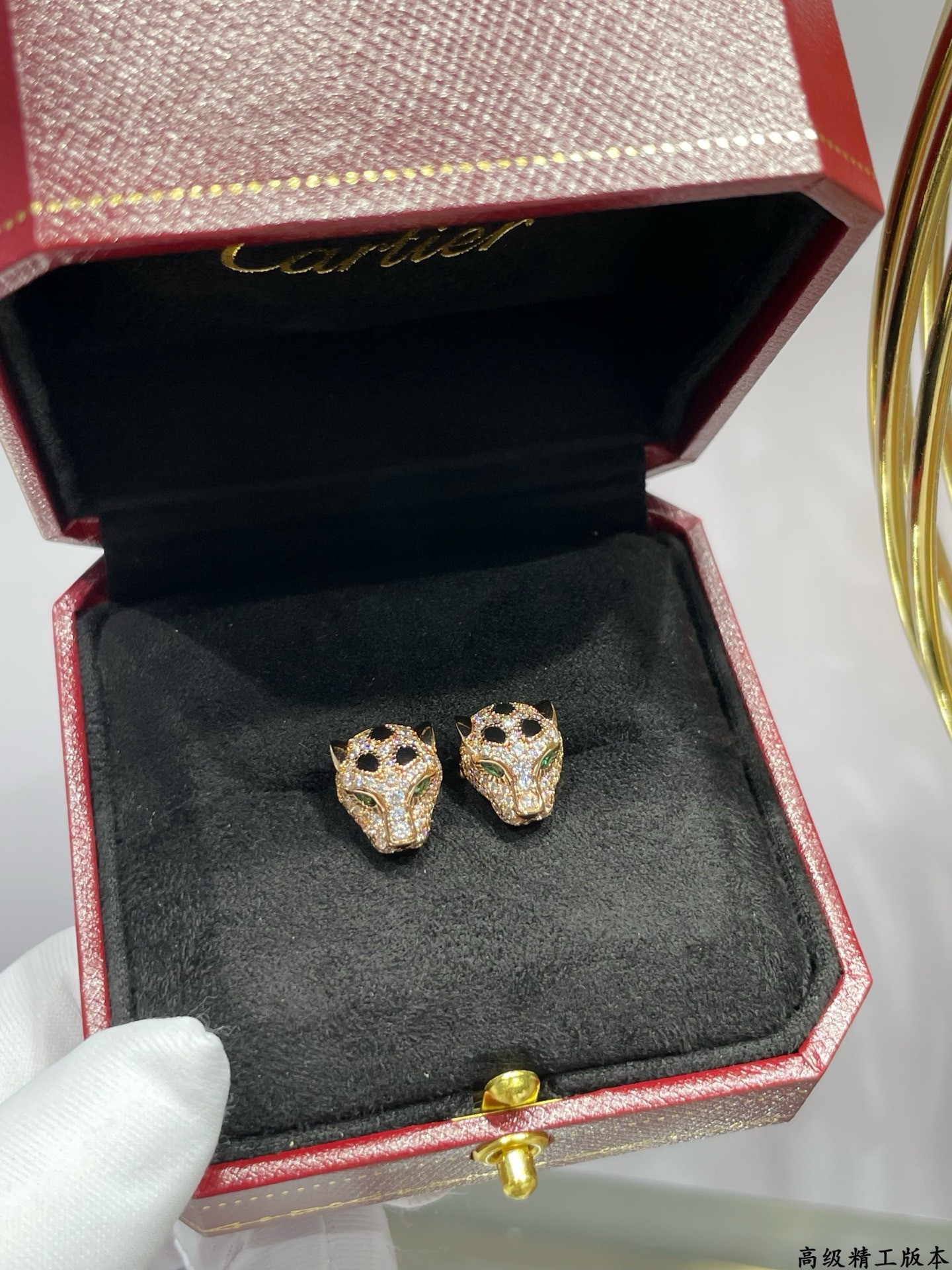 Ca*t*er earrings