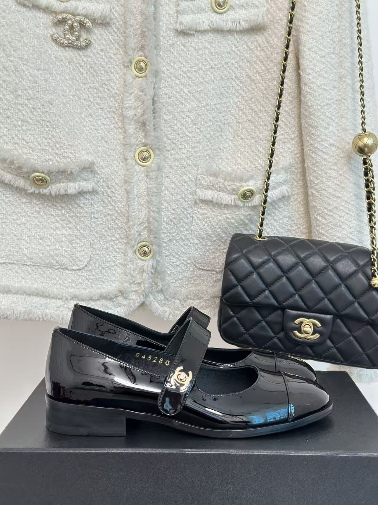 ua Ch*el patent mary janes