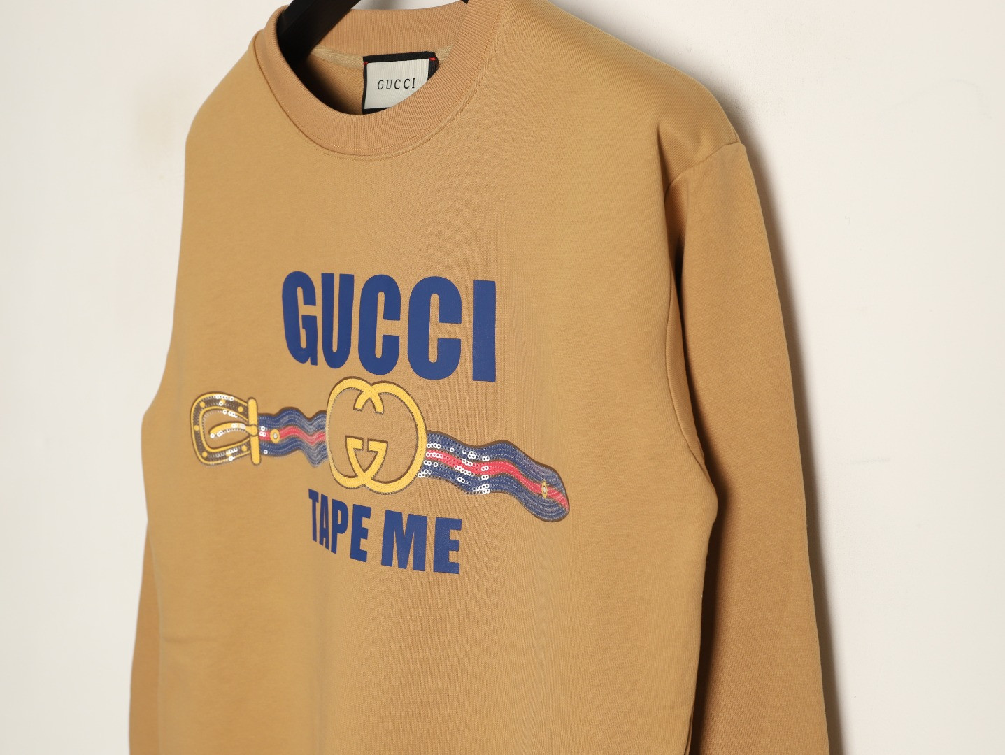 G*u*i hoodies