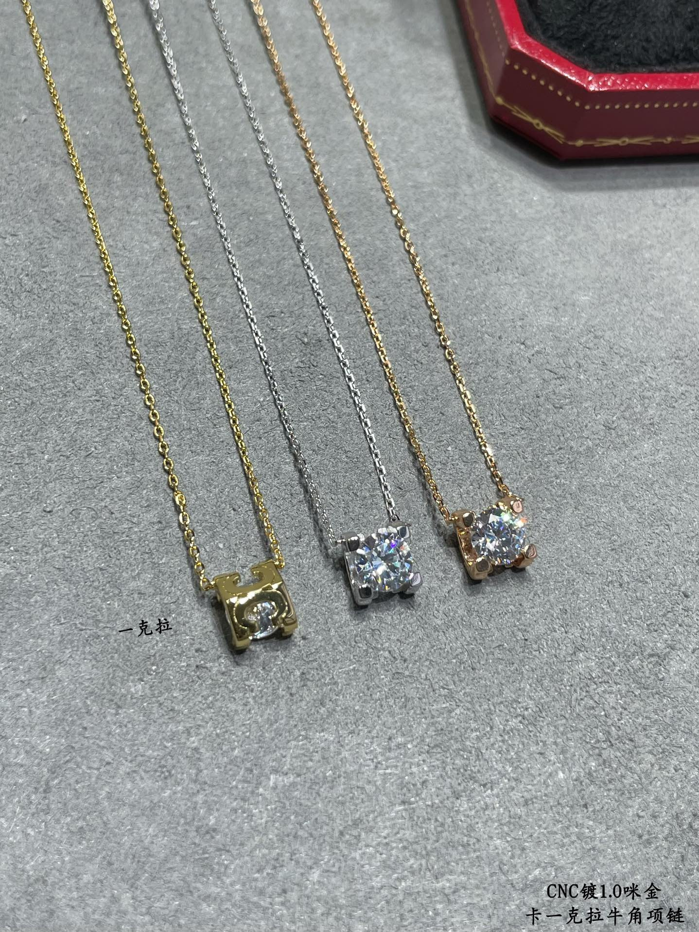 Ca*t*er one carat horn necklace