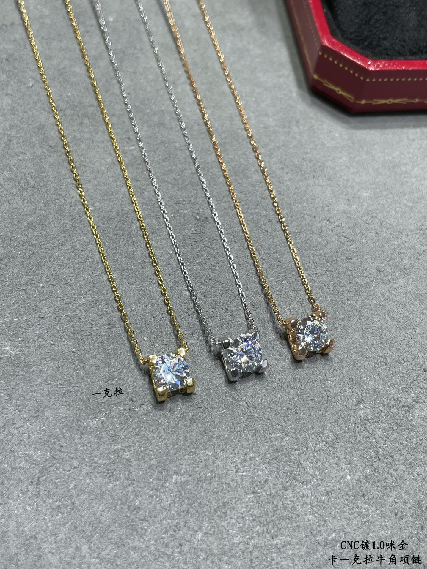 Ca*t*er one carat horn necklace