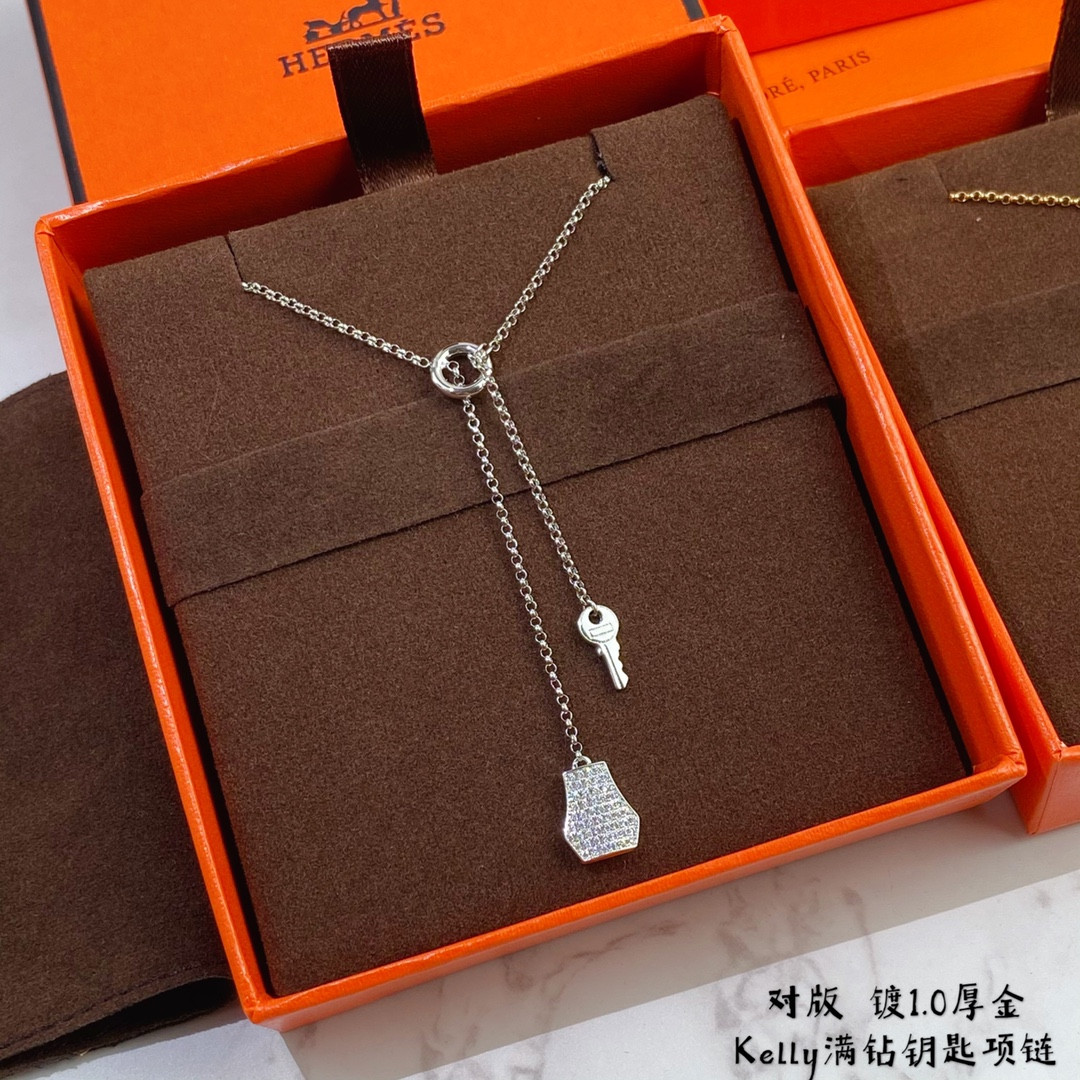 H**mes lock and key necklace