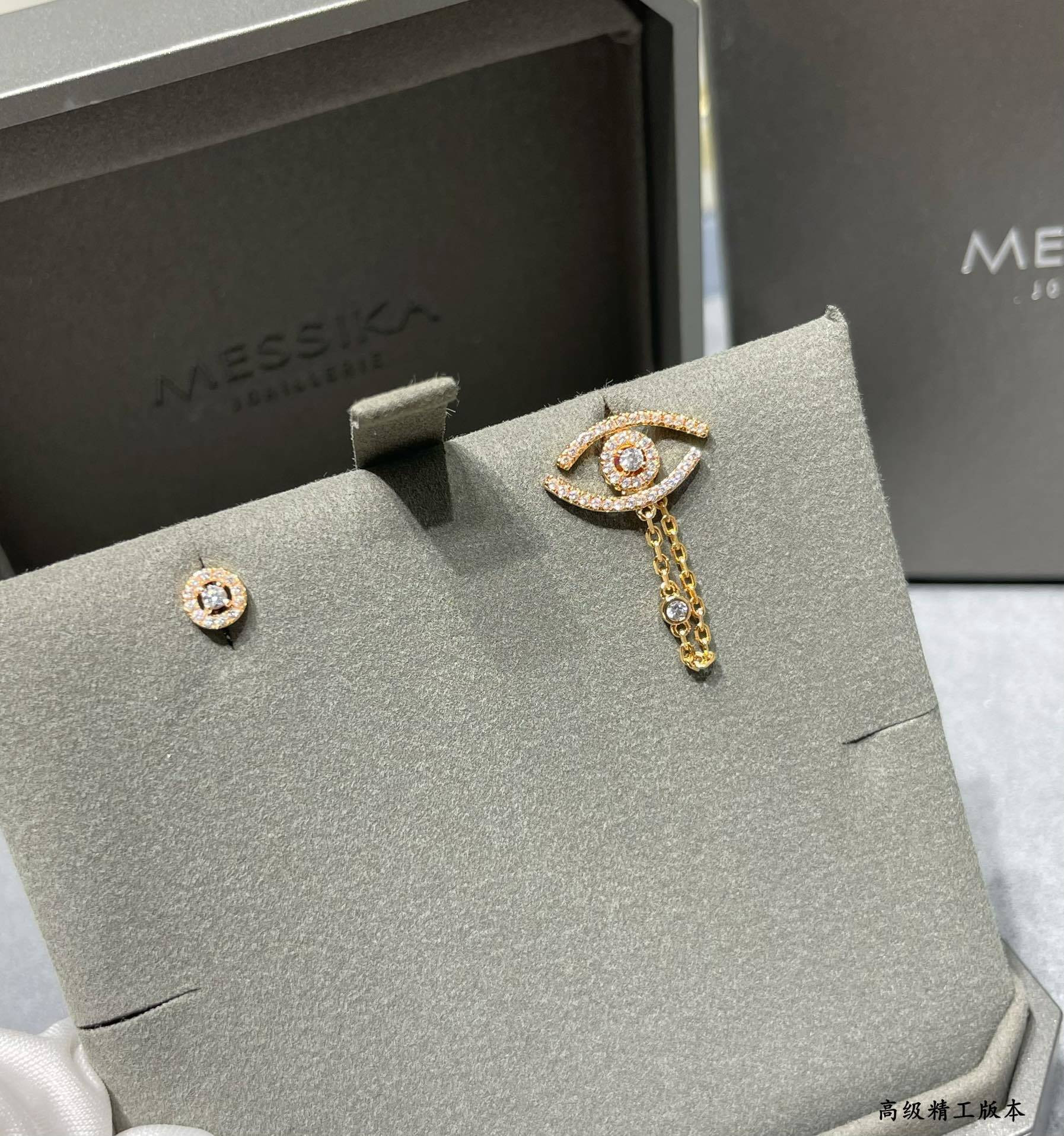 Mes1kaa "eye of the soul" full di*m*nd stud earrings