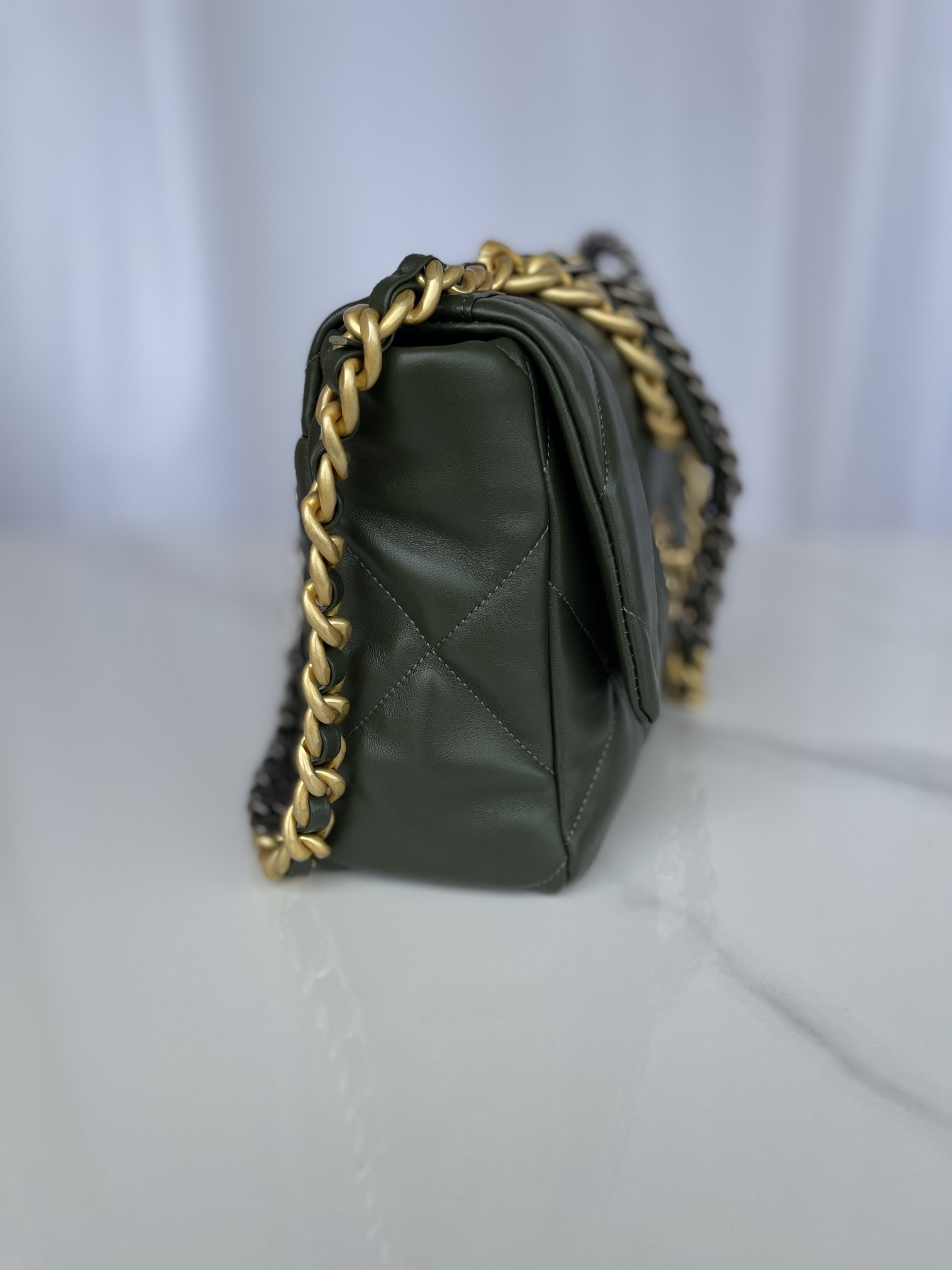 Ch*el 19 large handbag shiny leather, gold-tone, silver-tone & ruthenium-finish metal dark green 7.8 × 11.7 × 3.9 in