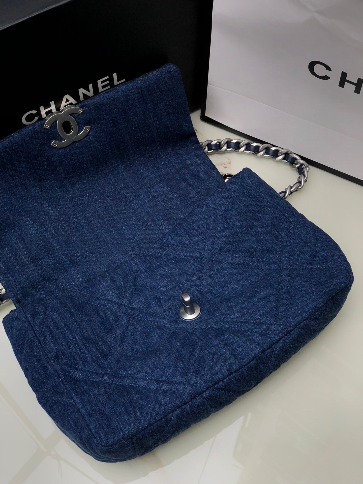 Ch*el 19 large handbag, gold-tone, silver-tone & ruthenium-finish metal blue 7.8 × 11.7 × 3.9 in