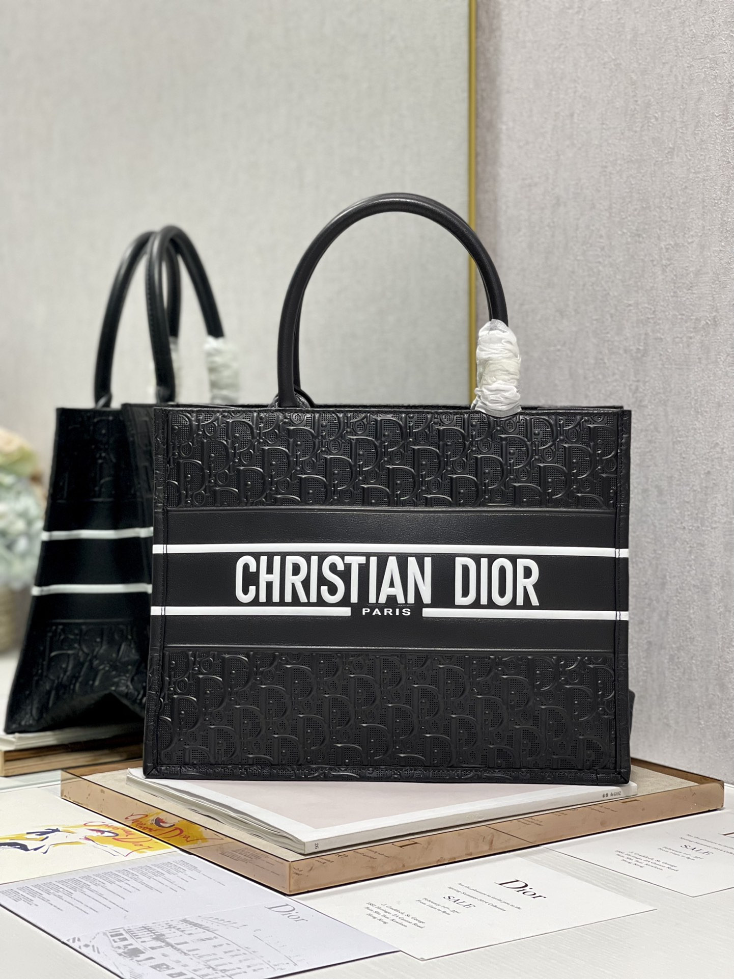 calfskin embossed medium D*or book tote black white 14 x 11 x 6.5 inches