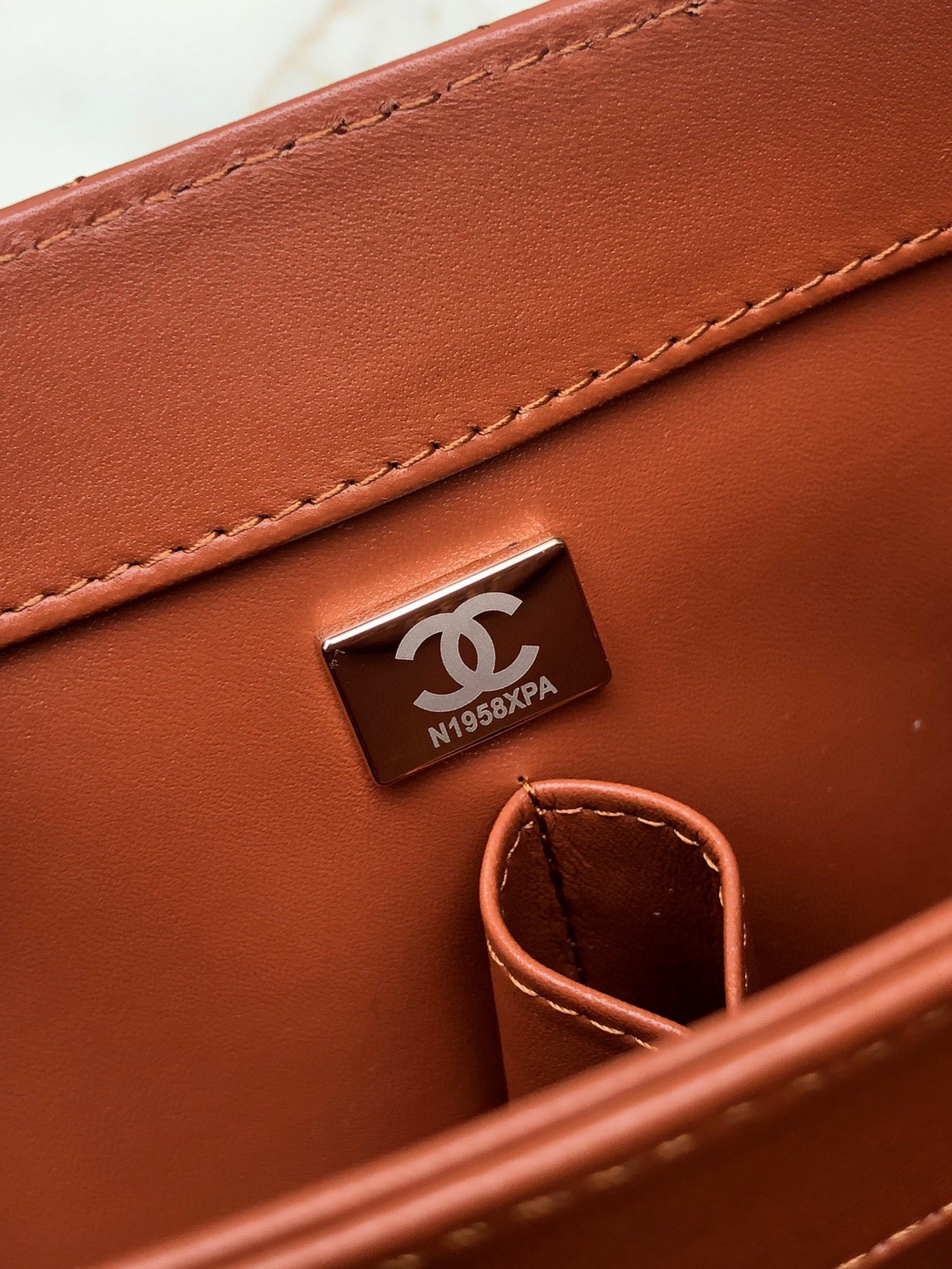 Ch*el flap bag with top handle orange 6.6 × 9.8 × 4.7 in