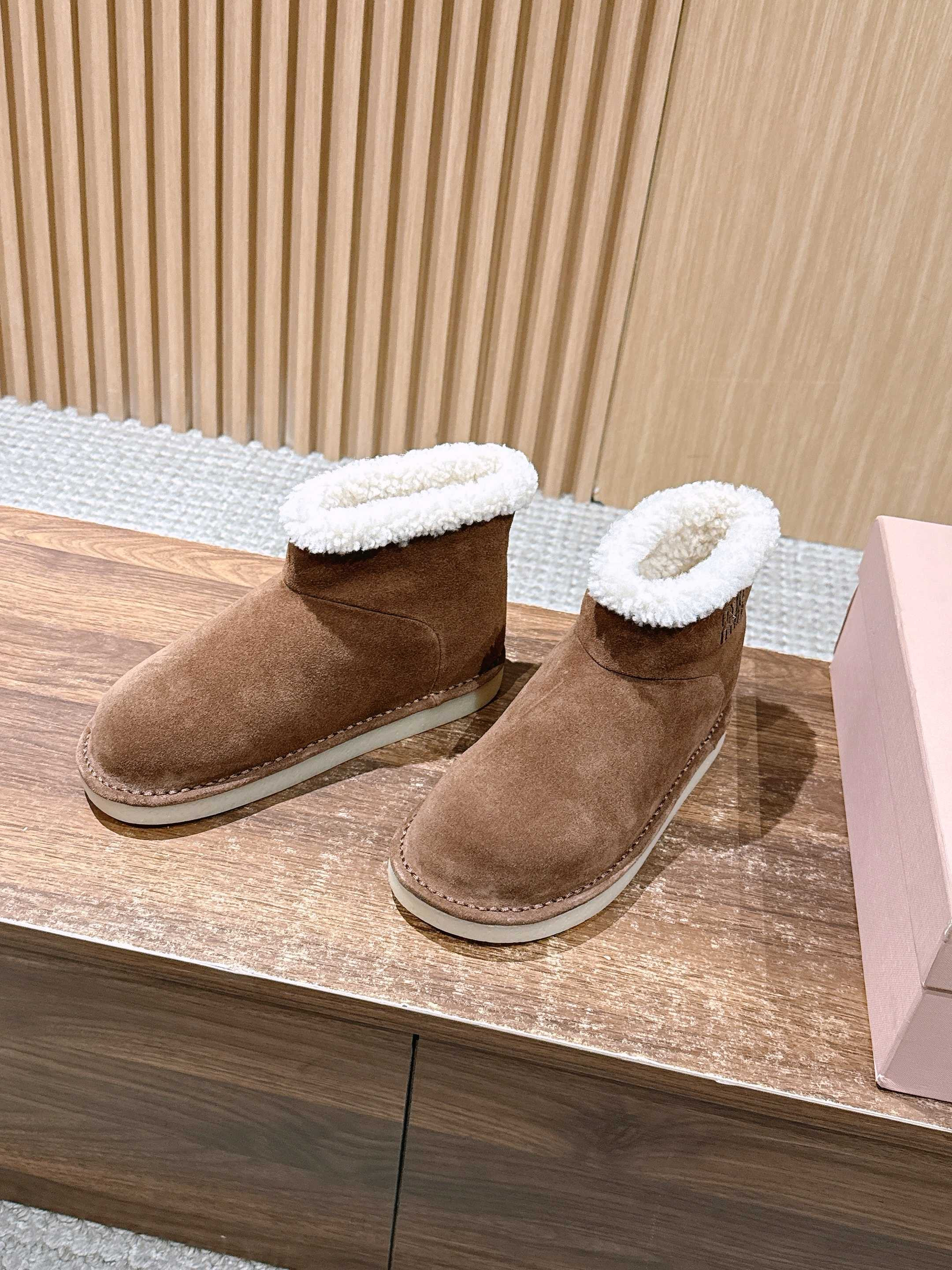 ua M1v M1v suede and shearling booties